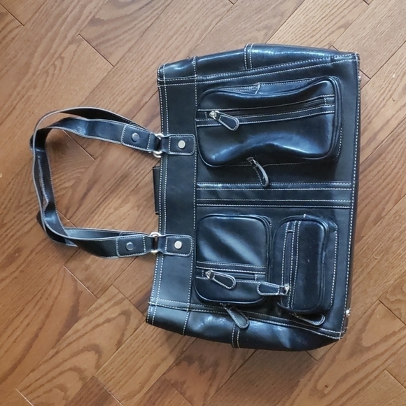 BLACK bag. Perfect for travel or work. Many pockets on outside and inside. - Picture 1 of 11